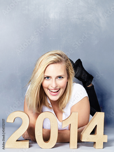 Photo: Woman presenting the New Year 2014 Woman presenting the New Year 2014