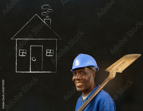 Photo: African black man worker with chalk house on a background African black man worker with chalk house on a background
