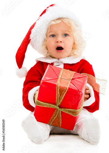 Photo: Female Santa with a gift Female Santa with a gift