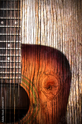  Acoustic guitar art on wooden background