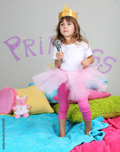 Photo: Little girl dancing and singing Little girl dancing and singing