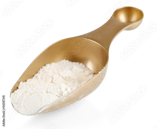 Photo: The wholemeal flour in scoop isolated on white The wholemeal flour in scoop isolated on white