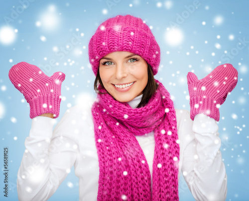 Photo: woman in hat, muffler and mittens woman in hat, muffler and mittens