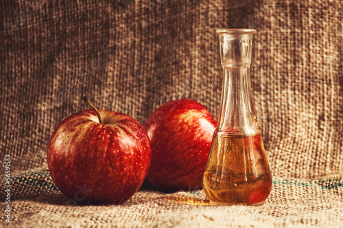Photo: Apple brandy on table Apple brandy on table