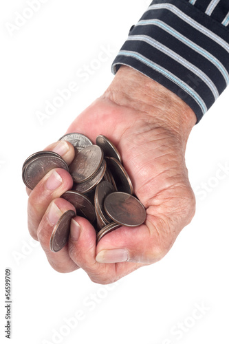 Photo: Elderly hand full of United States coins isolated on white Elderly hand full of United States coins isolated on white