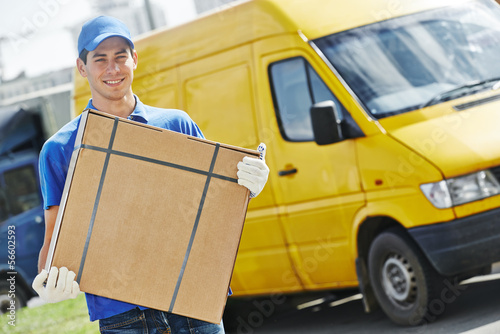 Photo: Delivery man with parcel box Delivery man with parcel box