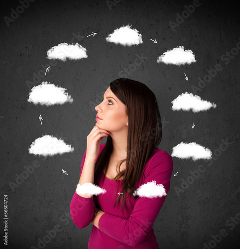 Photo: Young woman thinking with cloud circulation around her head Young woman thinking with cloud circulation around her head