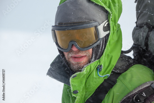Photo: Hiker covered with snow and ice closeup Hiker covered with snow and ice closeup