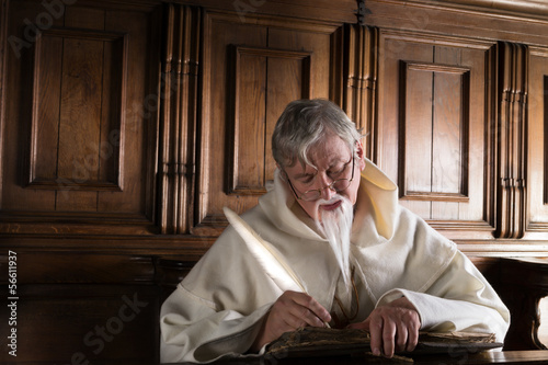 Photo: Monk writing with quill Monk writing with quill
