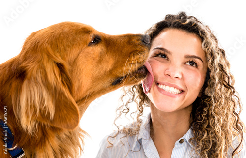 Photo: Dog licking womans face Dog licking womans face