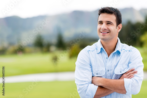 Photo: Thoughtful man outdoors Thoughtful man outdoors