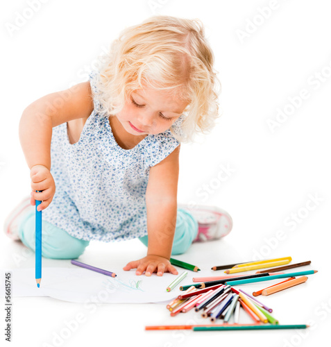 Photo: Girl drawing on the floor Girl drawing on the floor