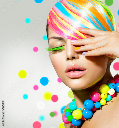 Photo: Beauty Girl Portrait with Colorful Makeup, Nails and Accessories Beauty Girl Portrait with Colorful Makeup, Nails and Accessories
