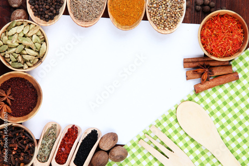 Photo: Various spices and herbs with empty white blank for recipe Various spices and herbs with empty white blank for recipe