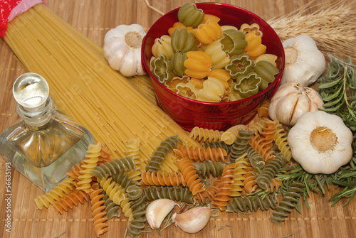 Photo: Pasta spaghetti with food ingredient and spices Pasta spaghetti with food ingredient and spices