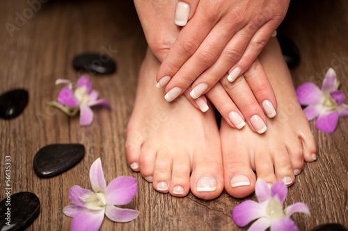  Relaxing pink manicure and pedicure with a orchid flower