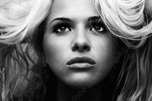 Photo: Beautiful blond woman.volume hair.high contrast Beautiful blond woman.volume hair.high contrast