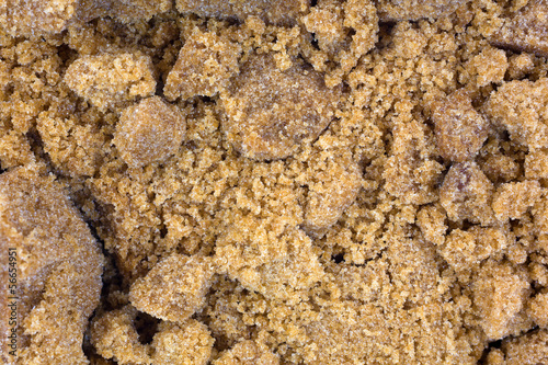 Photo: A very close view of dark brown sugar A very close view of dark brown sugar