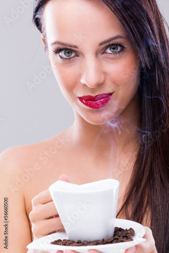 Photo: Woman with hot coffee Woman with hot coffee