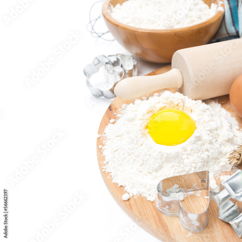 Illustration: ingredients for baking cookies - flour, egg and baking forms ingredients for baking cookies - flour, egg and baking forms