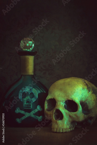Photo: Skull with poison bottle Skull with poison bottle