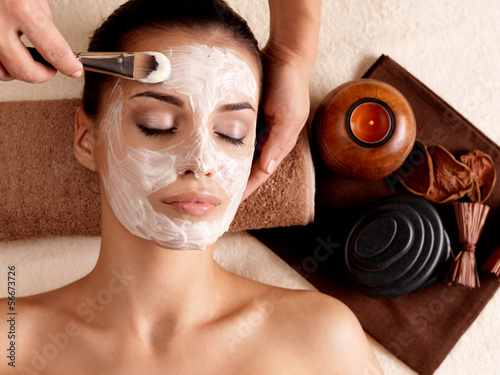 Photo: Spa therapy for woman receiving facial mask Spa therapy for woman receiving facial mask