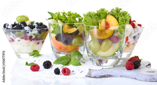 Photo: Fruit salad in glasses, isolated on white Fruit salad in glasses, isolated on white