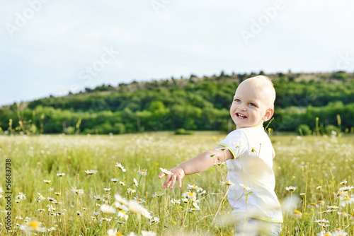Photo: boy running in field boy running in field
