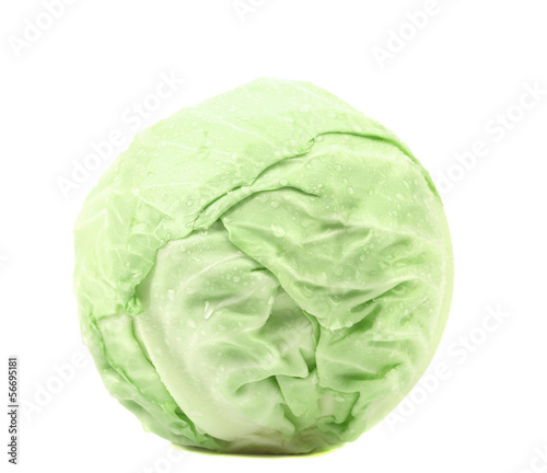 Photo: Whole green cabbage isolated on white Whole green cabbage isolated on white