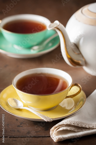 Photo: Serving tea on a table Serving tea on a table