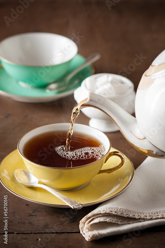Photo: Serving tea on a table Serving tea on a table