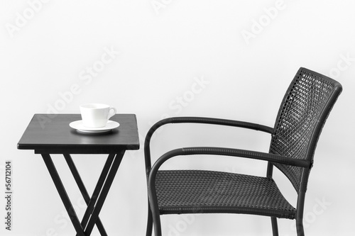 Photo: Chair, table and teacup Chair, table and teacup