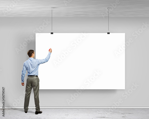 Photo: Businessman with banner Businessman with banner