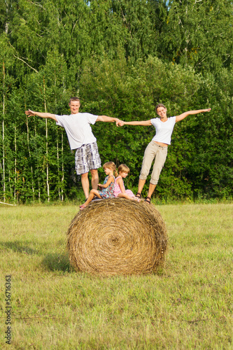 Photo: Family with children on vacation outdoors Family with children on vacation outdoors