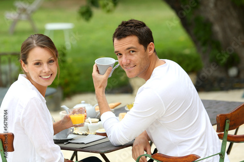 Photo: Romantic breakfast in hotel garden Romantic breakfast in hotel garden