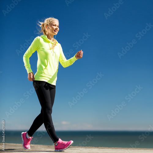Photo: woman doing sports outdoors woman doing sports outdoors