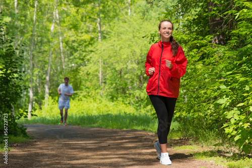 Photo: healthy young female athlete running healthy young female athlete running