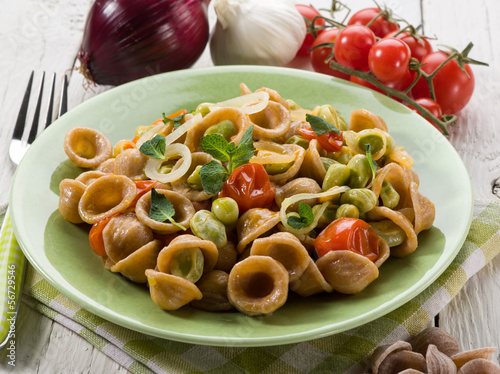 Photo: orecchiette with bean broad and fresh tomatoes orecchiette with bean broad and fresh tomatoes