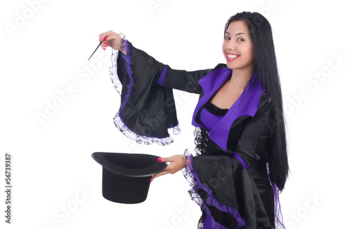 Photo: Woman magician isolated on the white Woman magician isolated on the white