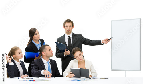Photo: Manager showing something on screen to the group of managers Manager showing something on screen to the group of managers