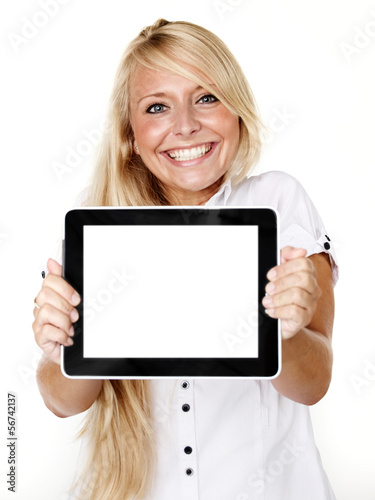 Photo: Woman presenting her tablet pc with copyspace Woman presenting her tablet pc with copyspace