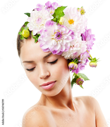 Photo: fashion model with flowers in her hair. fashion model with flowers in her hair.