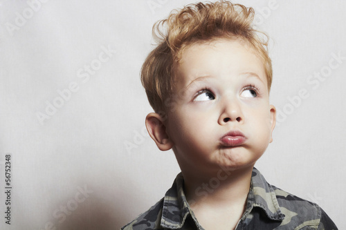 Photo: child. funny little boy.joy. 4 eyers old. military shirt child. funny little boy.joy. 4 eyers old. military shirt