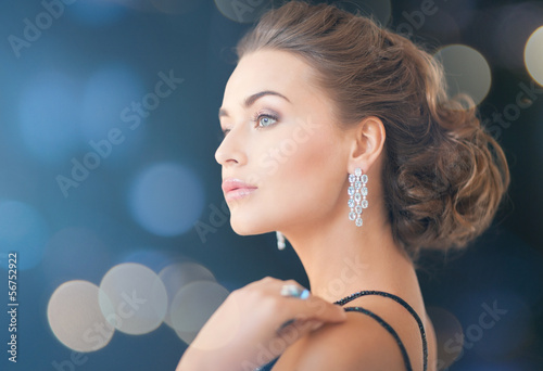 Photo: woman with diamond earrings woman with diamond earrings