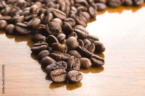 Photo: Coffee on wooden background Coffee on wooden background