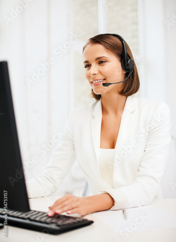 Photo: friendly female helpline operator friendly female helpline operator