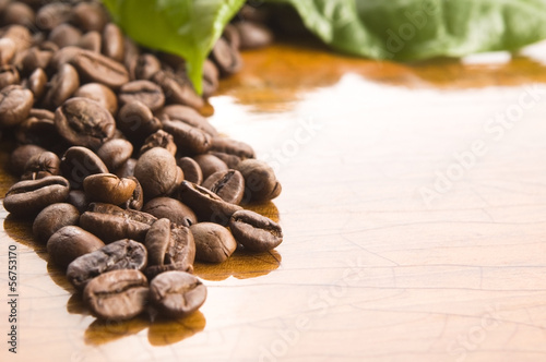 Photo: Coffee on wooden background Coffee on wooden background
