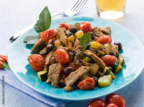 Photo: meat stew with tomatoes zucchinis and olives meat stew with tomatoes zucchinis and olives