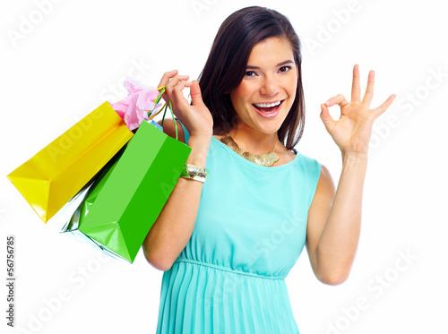 Photo: Happy shopping woman with bags. Happy shopping woman with bags.