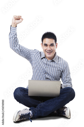 Photo: Successful online man with laptop Successful online man with laptop